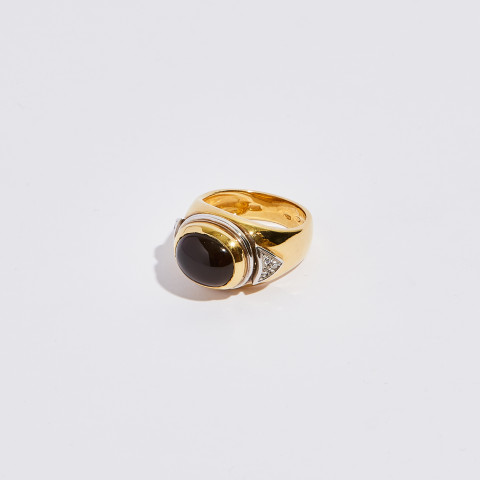 Anello oro giallo 18 Kt con brillanti 0,06 Kt e granato 